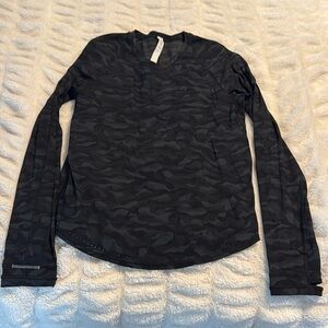 Lululemon animal print black top size 4